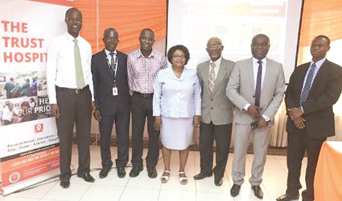 Management of the hospital in a group photograph after the launch